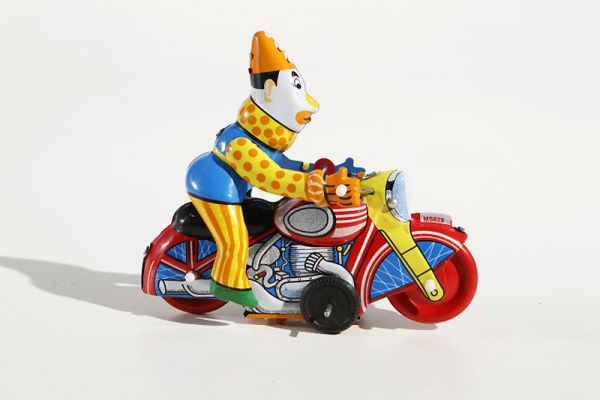 Blechspielzeug Clown auf Motorrad